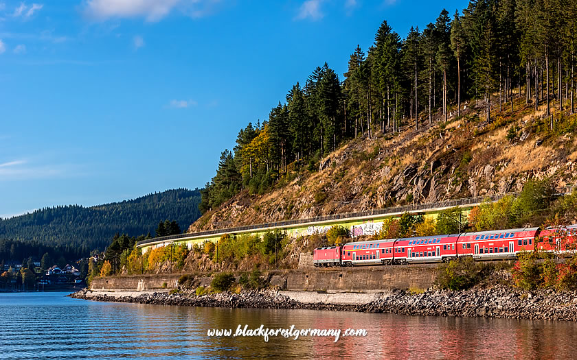 Train passing the Schluchsee in the Black Forest
